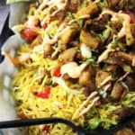 Halal Cart's boldly flavored Middle Eastern Chicken and fragrant Turmeric Rice with a spicy yogurt sauce.