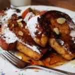 An easy, quick and delicious recipe for a fantastic French Toast topped with crunchy sliced almonds and maple syrup.