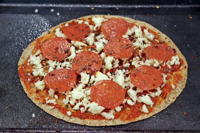 Weight Watchers Pepperoni Pizza baked on a whole wheat tortilla with melty mozzarella and pepperoni, this pizza is one of the most satisfying ways you can enjoy a 6 point meal! 