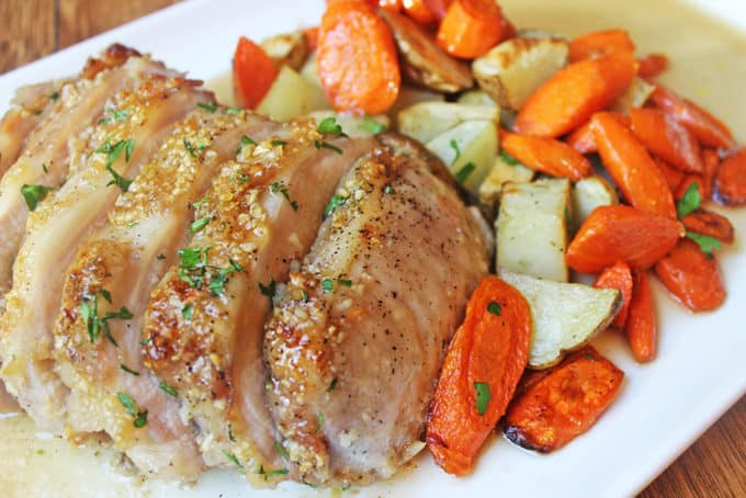 Just 6 ingredients and less than an hour are all that separate you from this awesome caramelized Brown Sugar Garlic Pork and roasted vegetables.