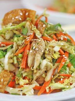 Lightly dressed Chinese Chicken Salad with grilled chicken, crunchy wontons, toasted almond and sprinkled with sesame seeds over a crunchy napa cabbage and carrot salad. Done in 15 minutes!