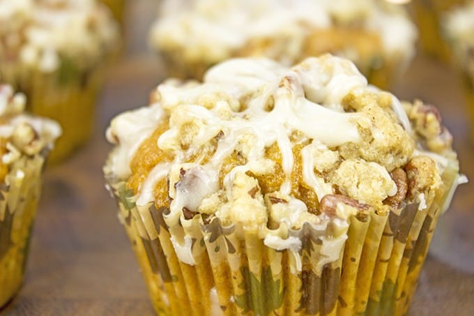 A delicious pumpkin muffin topped with a pecan streusel crunch and drizzled with a maple icing. It is all the amazing flavors of fall all rolled in to a delicious breakfast treat.