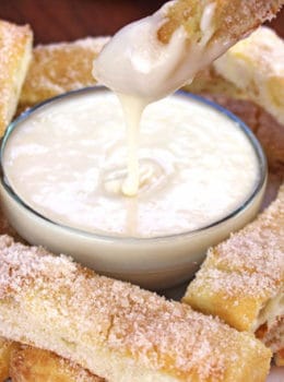 Sweet Cinnamon Stix (Pizza Sticks) like the ones from Domino's... but better because of real butter! and sweet vanilla dipping sauce make pizza night at home feel like you ordered out.