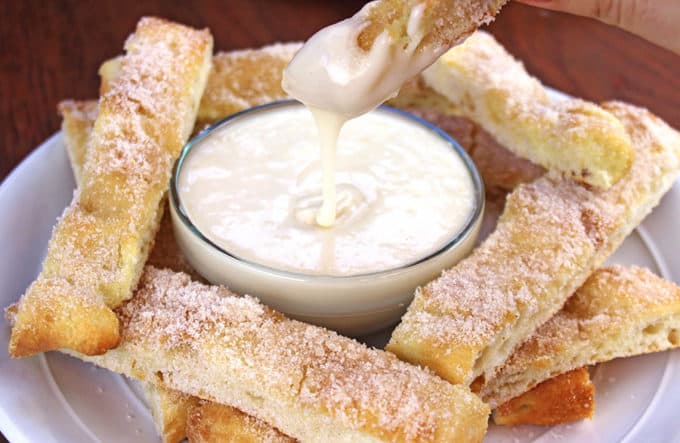 Sweet Cinnamon Stix (Pizza Sticks) like the ones from Domino's... but better because of real butter! and sweet vanilla dipping sauce make pizza night at home feel like you ordered out.