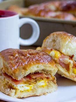 Baked Bacon Egg and Cheese Hawaiian Sliders are quick to make. They're a perfect make ahead and bake the morning of option for get togethers and can quickly serve a crowd!