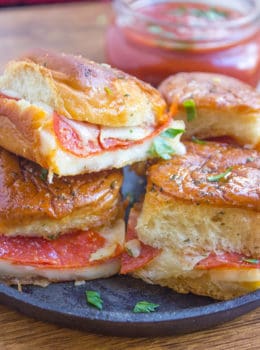 Pressed Pepperoni Pizza Party Rolls are crispy, cheesy, dippable and perfect make ahead for serving a crowd!