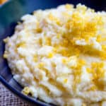 Oven Baked Creamy Cheese Polenta made with just four ingredients and none of the danger associated with boiling, bubbling hot polenta on the stove you have to keep stirring!