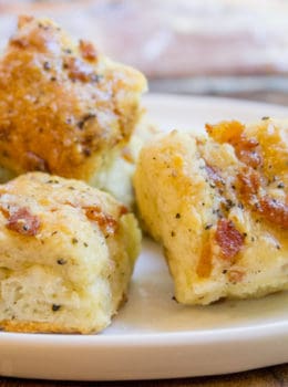 Black Pepper Bacon Biscuits are peppery, full of delicious bacon, cream cheese and buttermilk, they are fluffy and flaky. The perfect biscuit for your weekend brunch!