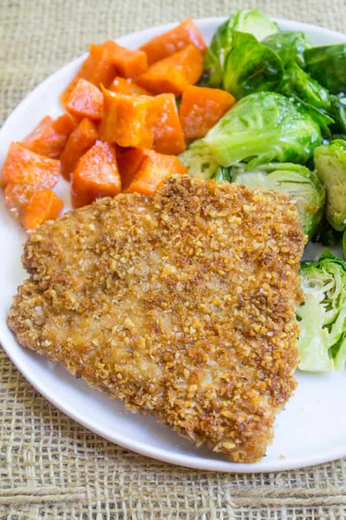 Pecan Crusted Barramundi is a breeze to make with a mixture of pecans and panko, this flaky white fish shines with just a few minutes of prep!