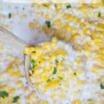 Slow Cooker Creamed Corn is super creamy, made with just a few ingredients and it won't take up any oven space or active cooking time when you're busy preparing for the holidays! dinnerthendessert.com