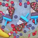 Banana Split Popsicles made with sorbets, chocolate shell and crushed peanuts. A healthy dairy-free take on the classic ice cream shoppe dessert!