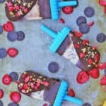 Banana Split Popsicles made with sorbets, chocolate shell and crushed peanuts. A healthy dairy-free take on the classic ice cream shoppe dessert!