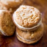 Peanut Butter Do-si-dos Cookie Sandwiches are a Girl Scouts favorite made with peanut butter and oatmeal are sandwiched together with a fluffy soft peanut butter buttercream filling.