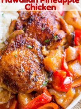 Slow Cooker Hawaiian Pineapple Chicken with crispy chicken thighs, fresh pineapple chunks, onions and bell pepper takes 15 minutes of prep and makes the perfect meal to come home to after a long workday!