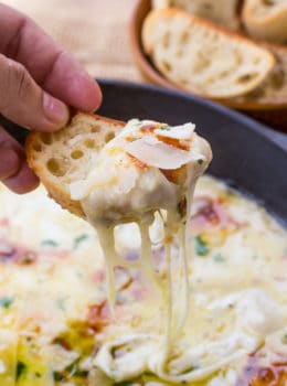 Baked Fontina Cheese Dip inspired by Ina Garten with garlic and thyme amped up with the addition of fresh mozzarella and Parmesan is the perfect appetizer.