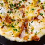 Baked Fontina Cheese Dip inspired by Ina Garten with garlic and thyme amped up with the addition of fresh mozzarella and Parmesan is the perfect appetizer.