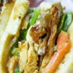Chicken Madness Philly Sub Sandwiches are a Georgetown University tradition and an amazing alternative to your classic Philly cheesesteak sandwich with peppers, onions, bacon, garlic and hot peppers.