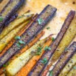 Garlic Butter Roasted Carrots with a touch of canola oil, cracked black pepper and Kosher salt makes the perfect side dish for a weeknight meal or a holiday crowd.