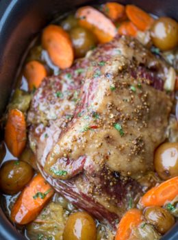 Slow Cooker Corned Beef Dinner all made in one pot with cabbage, potatoes and carrots for the perfect easy St. Patrick's Day dinner you can just set and forget.