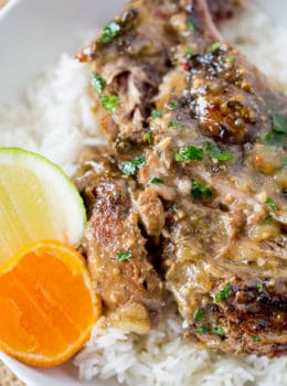 Slow Cooker Cuban Mojo Pork made with citrus, garlic, oregano and cumin takes almost no prep time and makes a fantastic, flavorful meal your family will love any night of the week!