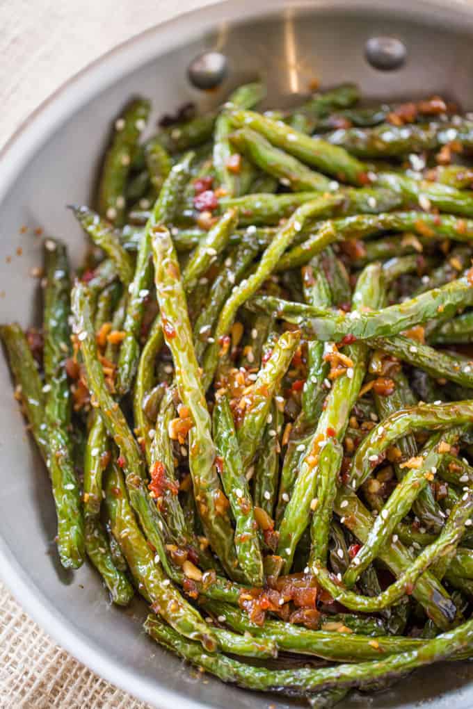 Spicy Chinese Sichuan Green Beans are the perfect easy side dish to your favorite Chinese meal and they're a breeze to make with just a few ingredients.