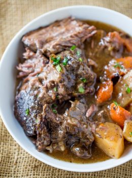 Ultimate Slow Cooker Pot Roast that leaves you with tender meat, vegetables and a built in gravy to enjoy them all with in just 15 minutes of prep! Perfect weeknight dinner!