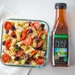 Easy Greek Pasta Salad with a homemade vinaigrette, pasta, feta, and olives is the perfect, easy lunch meal you can enjoy at room temperature. Also great with added chicken or shrimp.