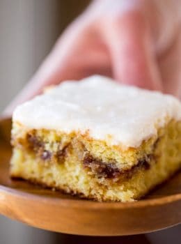 Honey Bun Cake with no cake mix, tastes like the classic honey buns you loved as a kid and like your favorite yellow cake growing up. Perfect for brunch and holiday parties.