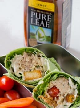 Slow Cooker Chicken Caesar Salad Wraps with shredded chicken, an easy anchovy free caesar dressing, croutons, tomatoes and Parmesan cheese in a spinach tortilla. Perfect for your lunchbox!