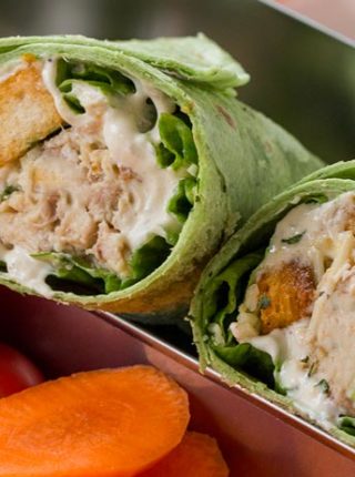 Slow Cooker Chicken Caesar Salad Wraps with shredded chicken, an easy anchovy free caesar dressing, croutons, tomatoes and Parmesan cheese in a spinach tortilla. Perfect for your lunchbox!