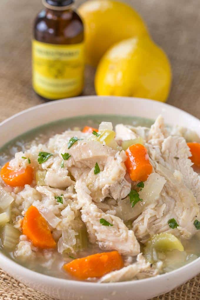 Slow Cooker Chicken and Rice Soup with lemon, brown rice and chicken breasts.