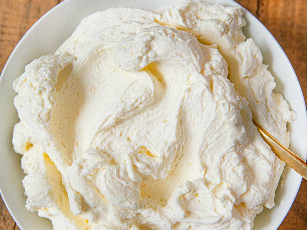 Fold whipped cream into cream cheese mixture Fold whipped cream into cream cheese mixture