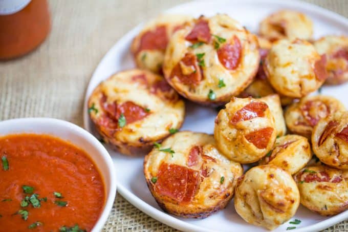 Pepperoni Pizza Bites are a cross between a bagel bite and a pizza muffin and they're ready to bake in just a few minutes.