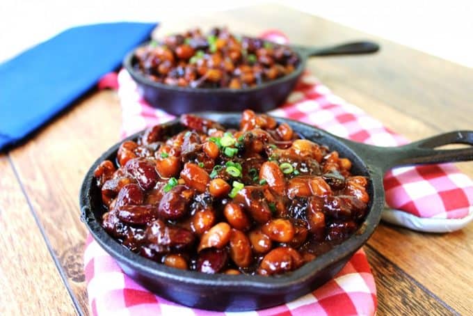 Beans in miniature skillets on place mats