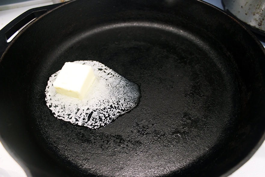 cast iron pan with butter 