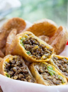 Cheesesteak Egg Rolls have all the flavors of the classic Philly Cheese Steak Sandwich in a crispy shell and made with ground beef! So easy to make and they taste...AMAZING.
