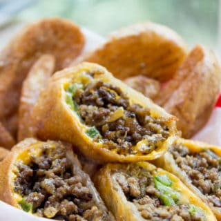 Cheesesteak Egg Rolls have all the flavors of the classic Philly Cheese Steak Sandwich in a crispy shell and made with ground beef! So easy to make and they taste...AMAZING.