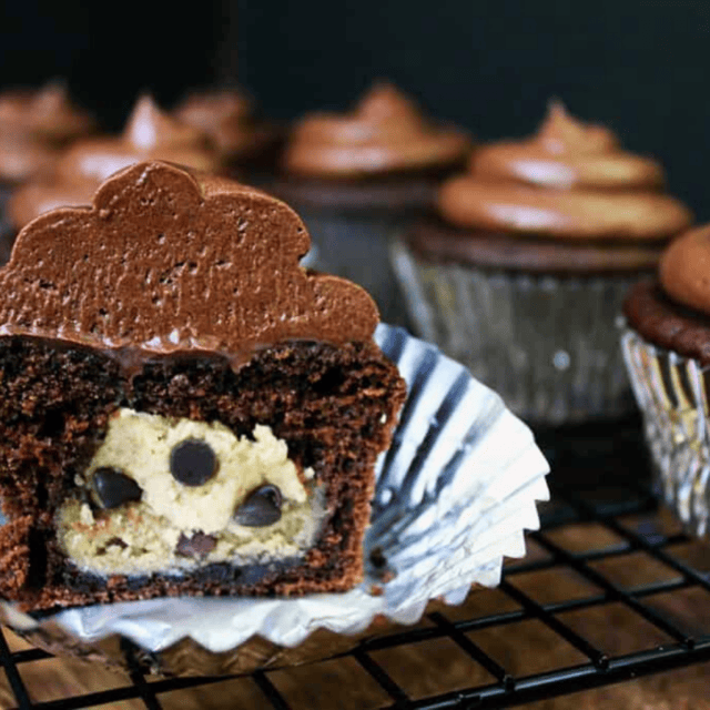 cross section of cupcake with cupcakes in the background