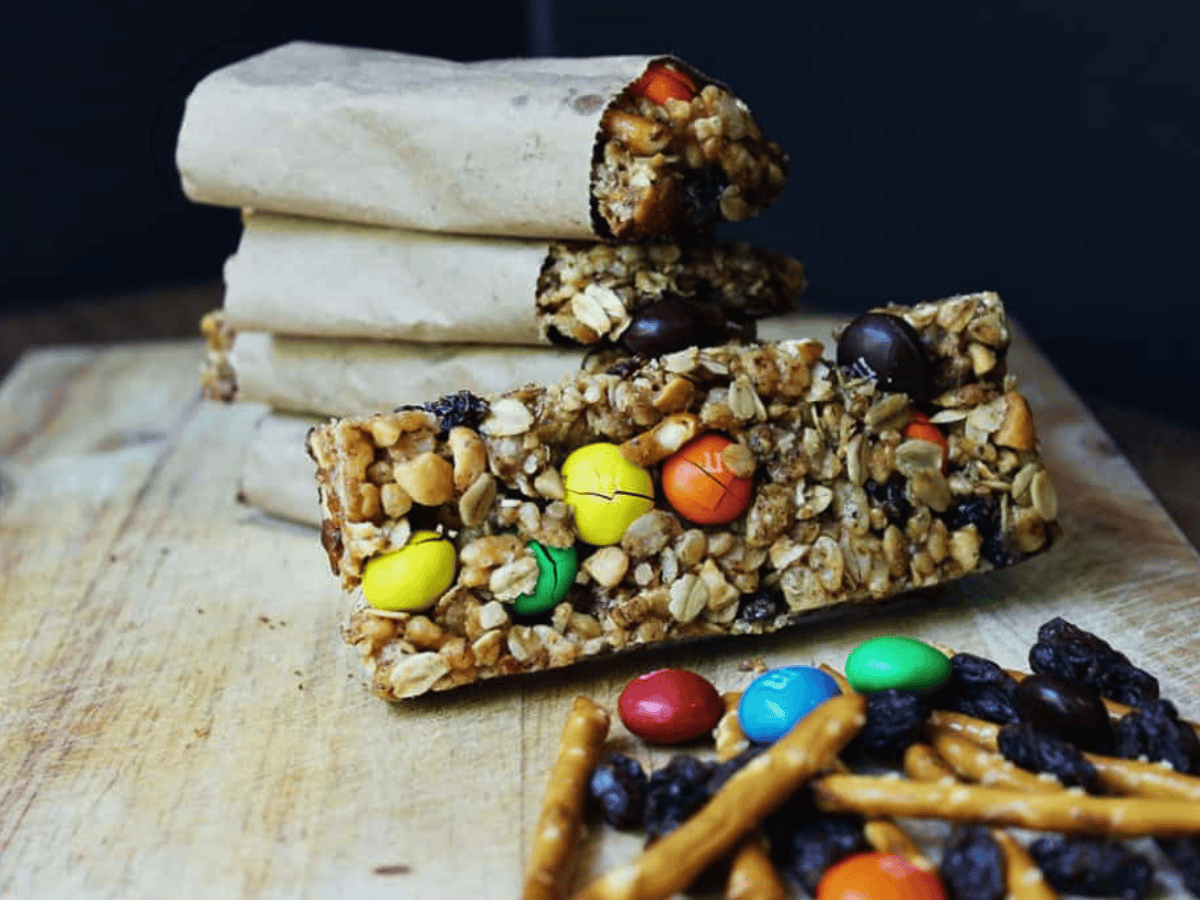 Granola bar with bars stacked in the background