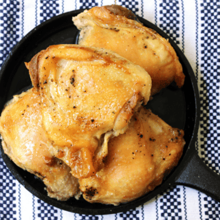 chicken plated on a cast iron skillet