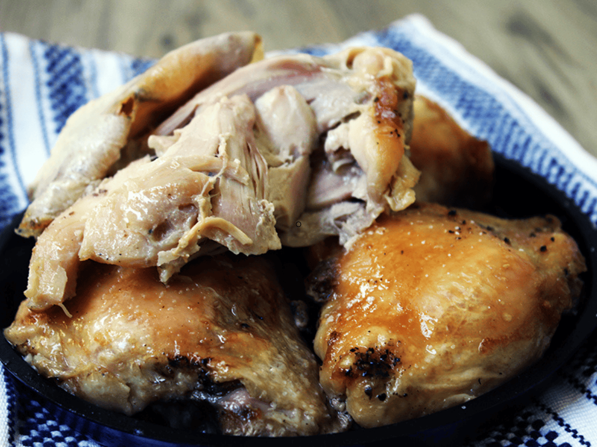 stacked chicken with bite taken out of top piece