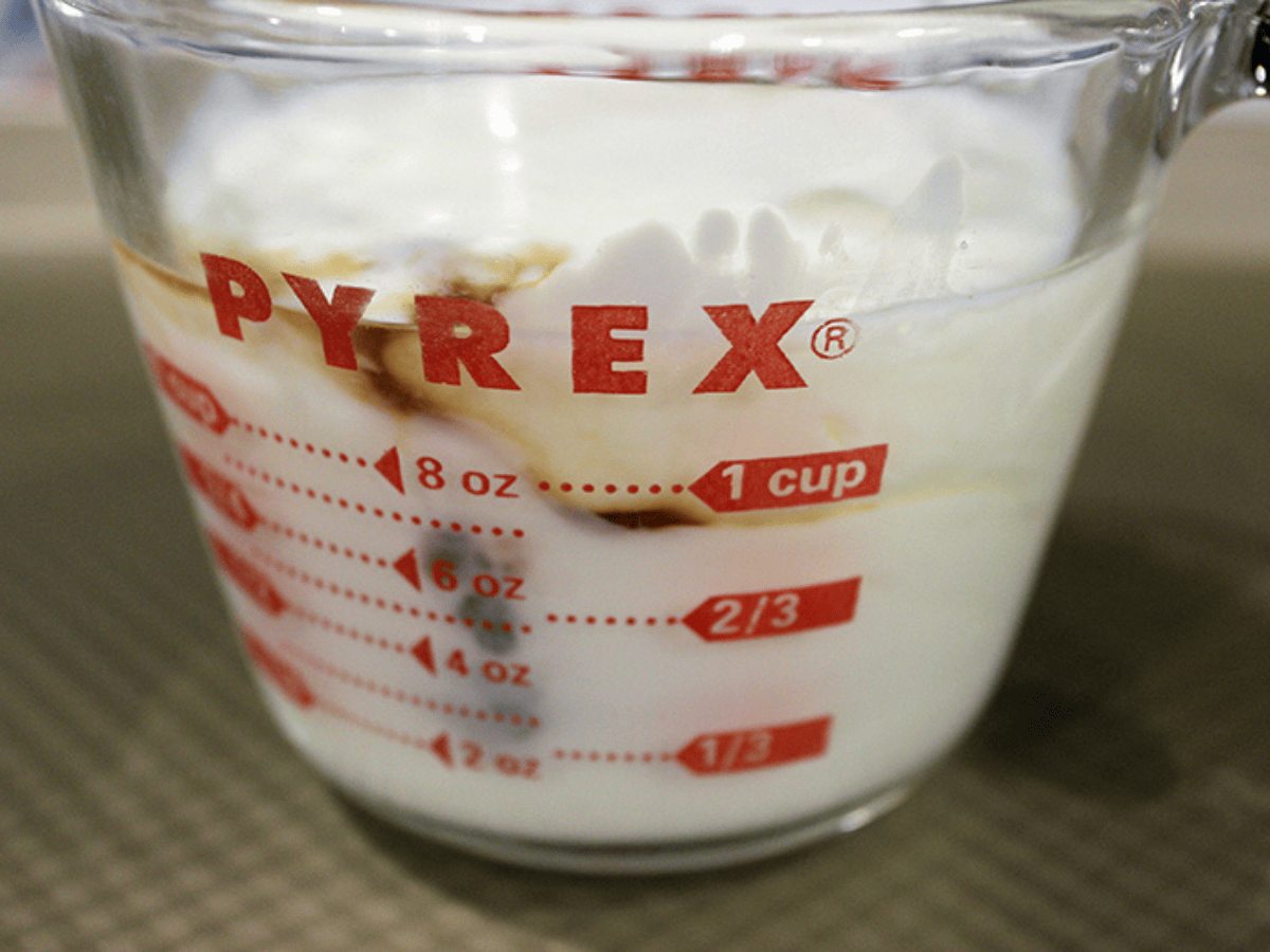 wet pancake ingredients in a measuring bowl