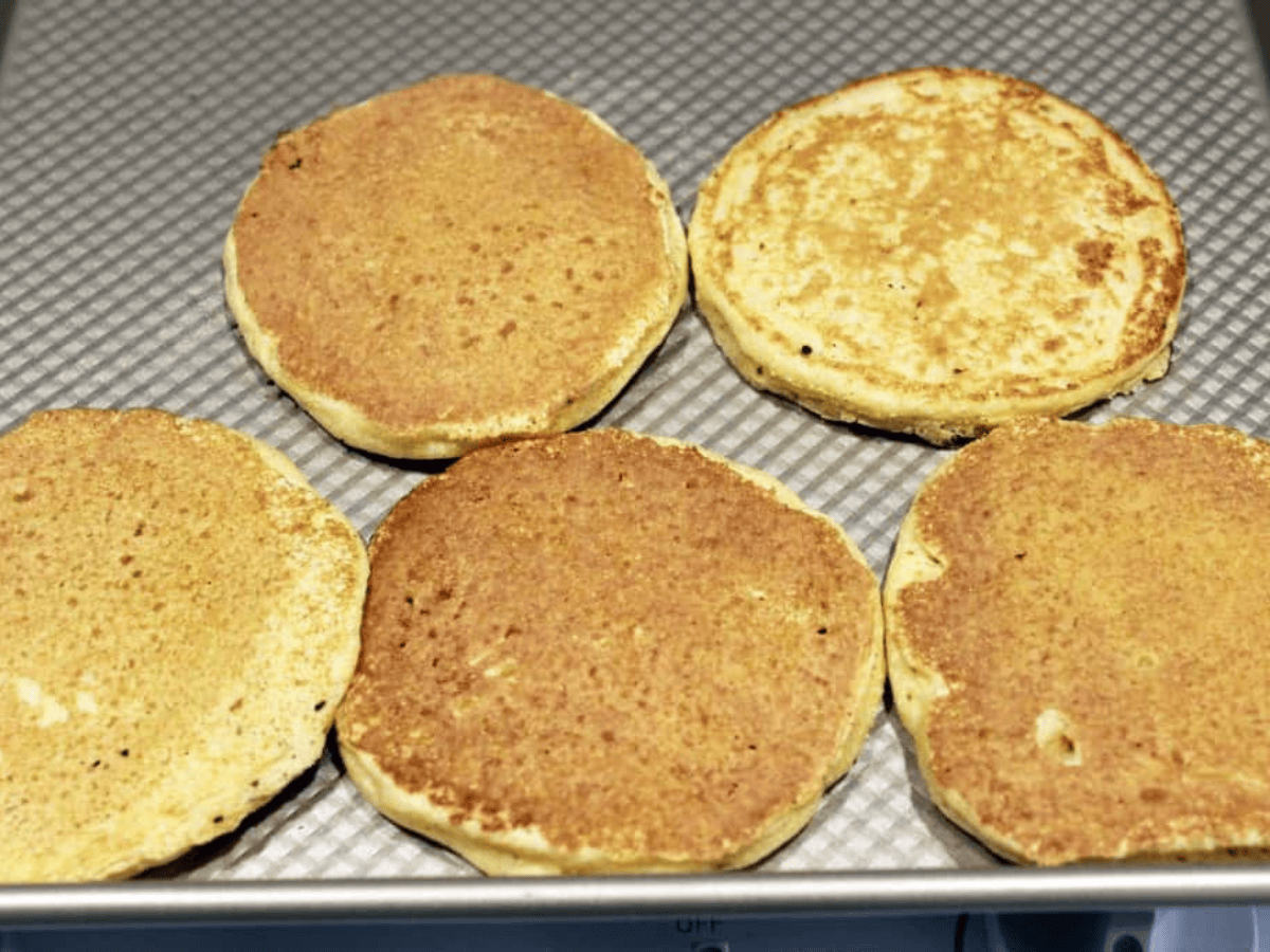 cooked pancakes on a griddle