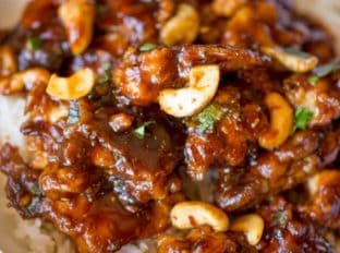 Cheesecake Factory's Spicy Cashew Chicken is spicy, sweet, crispy & crunchy, this dish is everything you could hope for and more in a copycat Chinese food recipe!