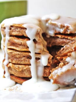 Fluffy, delicious pancakes that are easy to make and taste just like a cinnamon roll. With an icing similar to a cinnamon roll, you'll revel in the extra two hours of sleep you get when you're enjoying these with your morning cup of coffee!