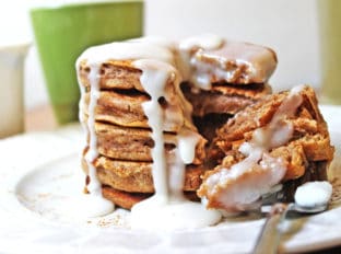 Fluffy, delicious pancakes that are easy to make and taste just like a cinnamon roll. With an icing similar to a cinnamon roll, you'll revel in the extra two hours of sleep you get when you're enjoying these with your morning cup of coffee!