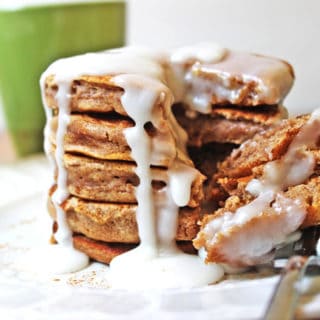 Fluffy, delicious pancakes that are easy to make and taste just like a cinnamon roll. With an icing similar to a cinnamon roll, you'll revel in the extra two hours of sleep you get when you're enjoying these with your morning cup of coffee!
