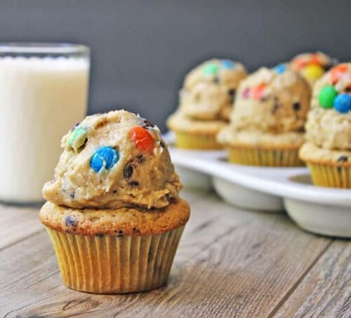 Cupcakes topped with Monster Cream Cheese Cookie Dough Frosting