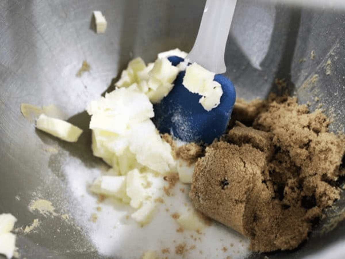 Ingredients mixed with spatula in a mixing bowl