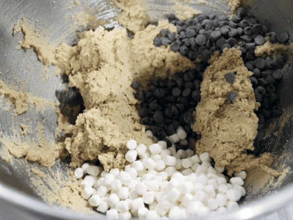 Chocolate chips mixed in bowl with other ingredients